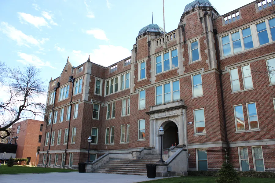 Jennings Hall, a red brick building in Winter